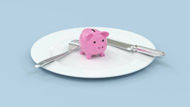 Bıçak ve çatalla beyaz bir tabağa yerleştirilmiş küçük pembe domuz kumbarası.