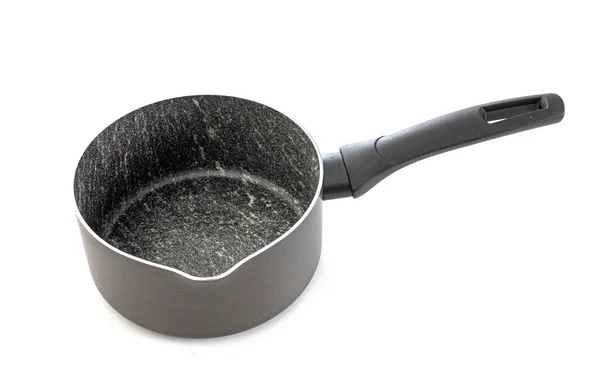 白い背景の前の黒い鍋 — ストック写真