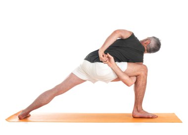 man and hatha yoga asana in front of white background clipart