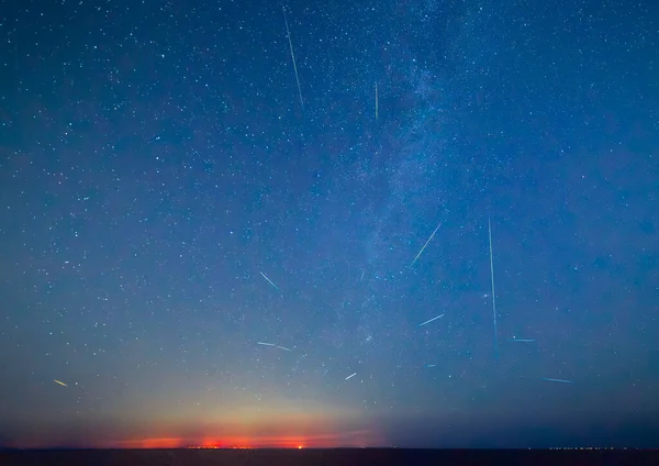 stock image Milky Way and Perseid Shower 2023 over Sicily - shot from Malta. Beautiful night sky with Milky Way and the coastal lights of Sicily as seen from Malta