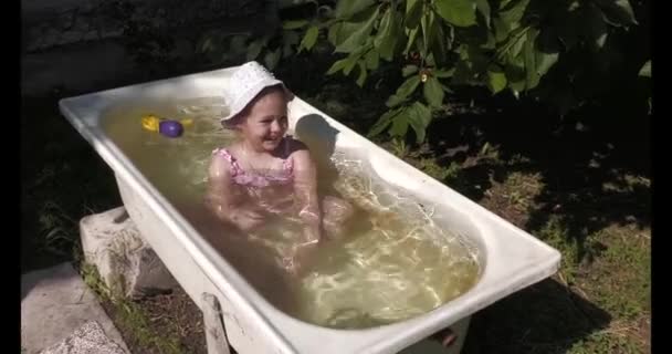 Child Girl Bathe Summer Bathtub Garden Visiting Village Grandparents — Stock video
