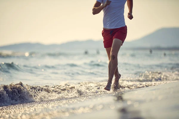 Lower Body Shot Young Man Jogging Beach Recreational Activity Summer — Stock Photo, Image