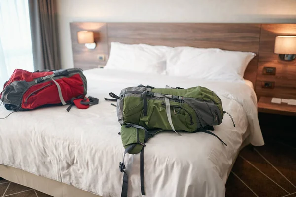 Two Backpack Travellers Arriving Hotel Room — Stock Photo, Image