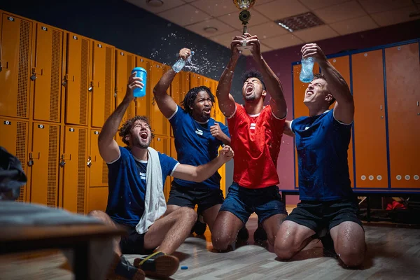 Group Soccer Players Celebrating Victory First Place Gold Trophy Shouting — Stock Photo, Image