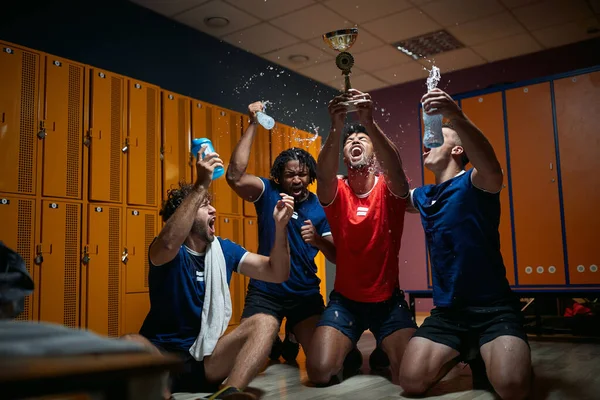 Sports Team Celebrating Success Group Men Players Holding Golden Medal — Stock Photo, Image