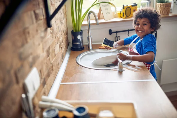 Young Afro American Boy Takes Responsibility Washing Dishes Great Enthusiasm — Stock Photo, Image