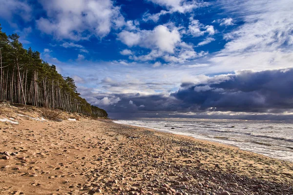 stock image Nature trail on the Baltic Sea coast. Approaching storm front at sunset