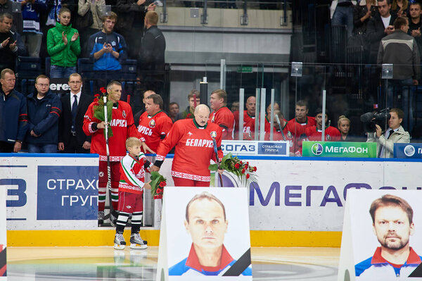 Minsk, Belarus - September 08, 2011 - Alexander Lukashenko with his son Nikolai at the requiem of the Locomotive team