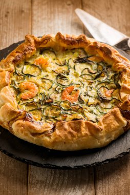 shrimp pie with zucchinis and mozzarella