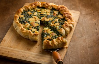salt pie with ricotta cheese and fresh spinach