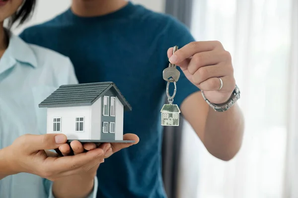 Happy Young Couple Buying New House Receiving Keys House Owner — Stock Photo, Image