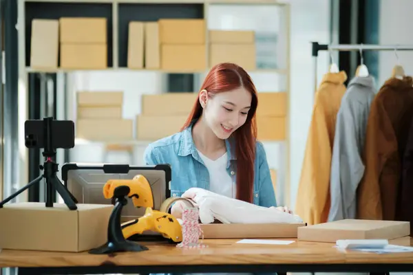 Smiling Female Entrepreneur Packing Clothing Items Shipping Her Startup Workshop — Stock Photo, Image