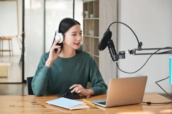 Woman Sitting Desk Laptop Microphone She Wearing Headphones She Recording — Stock Photo, Image