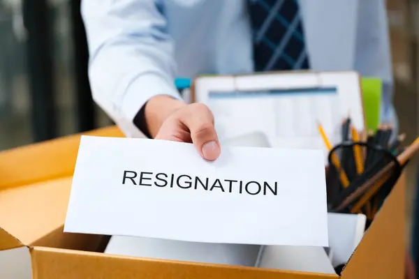 Close Man Hand Delivering Resignation Letter Box Personal Belongings Background — Stock Photo, Image