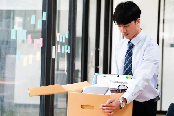 Male Employee Packing His Personal Belongings Cardboard Box Resignation Letter — Stock Photo, Image