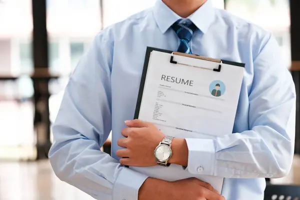 Close Businessman Hands Carefully Examining Resume Focusing Qualifications Job Candidate Stock Image