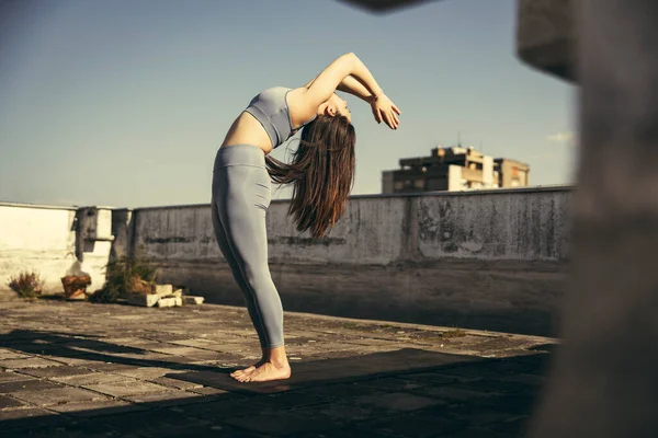 Relaxed Young Woman Practicing Yoga Rooftop Terrace — Foto Stock