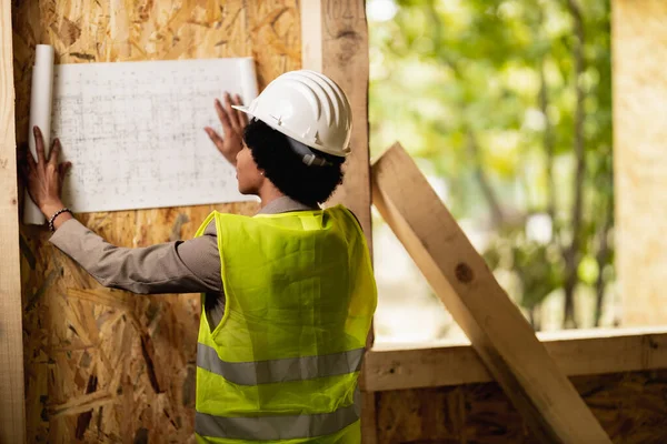Rear View African American Female Architect Checking Blueprints Construction Site — Stock Photo, Image