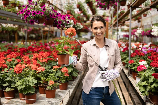 Young Woman Watering Flowers Caring Them Garden Center Plant Nursery — 스톡 사진