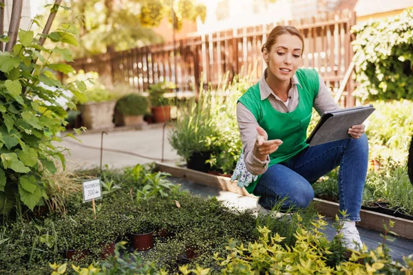 Smiling Young Woman Working Garden Center Using Digital Tablet Woman — 스톡 사진