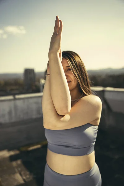 Relaxed Young Woman Practicing Yoga Rooftop Terrace Sunset — Stockfoto
