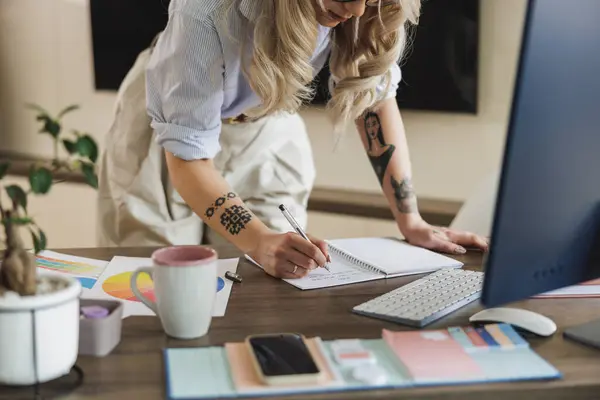 Close Unrecognizable Young Web Female Developer Taking Notes While Working — Stock Photo, Image