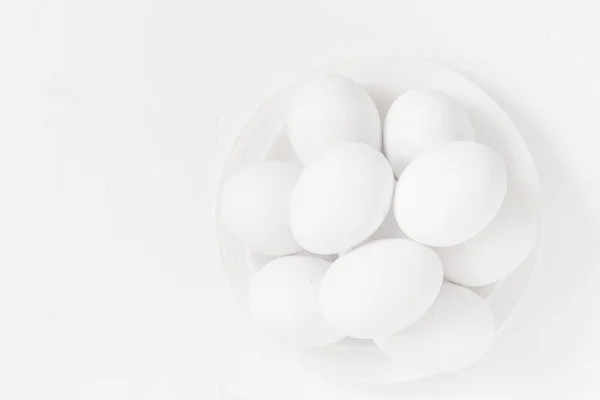 Osterhintergrund Weiße Eier Einer Schüssel Stockfoto
