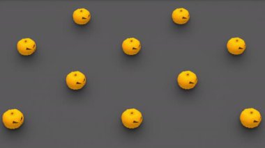 İzometrik görüntüde kabak şekillerinin soyut 3D görüntüsü. Bilgisayar tarafından üretilen döngü animasyonu. Cadılar Bayramı deseni, 4K kusursuz hareket tasarımı