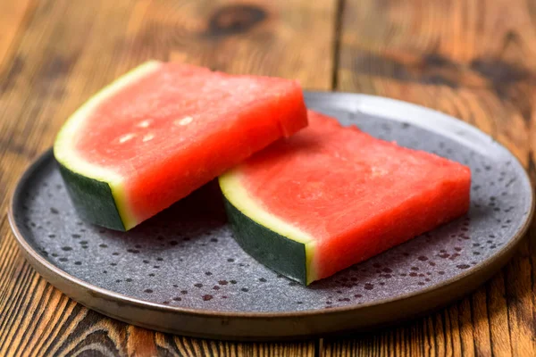 pieces of watermelon on a plate - dietary come sweet