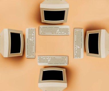 Kahverengi arka planda dört Vintage PC, üst görünümde. 90 'lardaki gibi monitör ve klavye