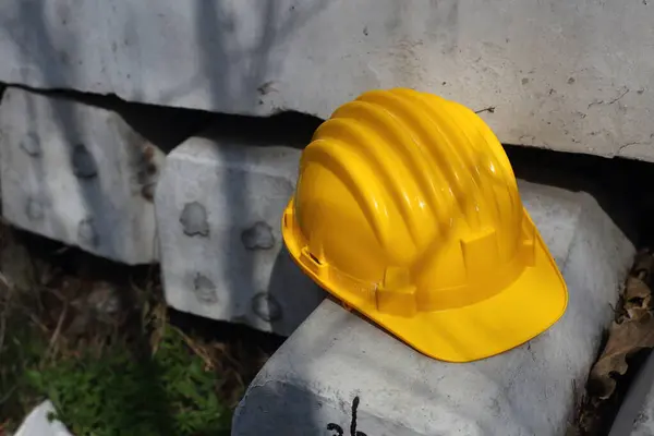 Safety First Yellow Helmet Work Place Stock Image