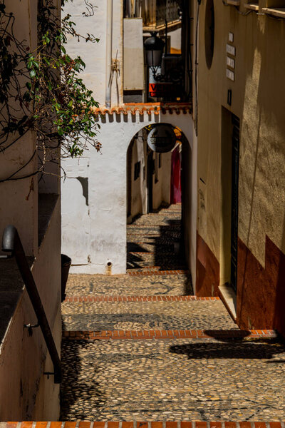 Beautiful narrow streets in the old town of Benidorm, Spain on a warm summer day