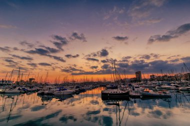 beautiful sunset in the port of Alicante, Spain with yachts