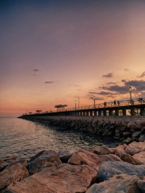beautiful sunset landscape of alicante spain with pier
