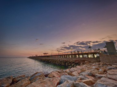 beautiful sunset landscape of alicante spain with pier