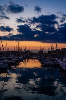 beautiful sunset in the port of Alicante, Spain with yachts