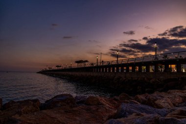 beautiful sunset landscape of alicante spain with pier