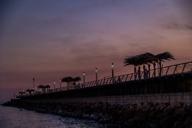 beautiful sunset landscape of alicante spain with pier