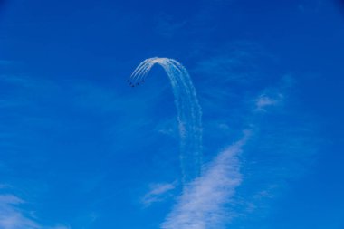 beautiful flight of five cessna planes over alicante smoke spanish flag against the blue sky spain