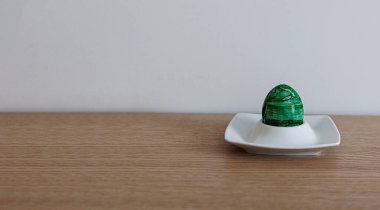 large colorful easter eggs on a stand decoration card