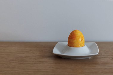 large colorful easter eggs on a stand decoration card