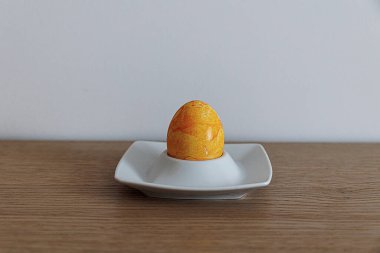 large colorful easter eggs on a stand decoration card