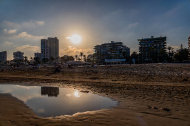 beautiful landscape wide sandy beach in alicante autumn day clouds playa San Juan 