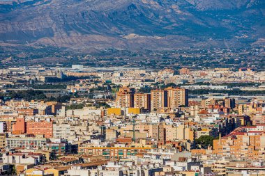 beautiful view on a sunny day of the city and colorful buildings from the viewpoint Alicante Spain