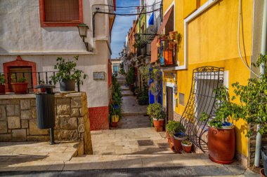 beautiful historic old colorful houses Barrio Santa Cruz Alicante Spain on a sunny day