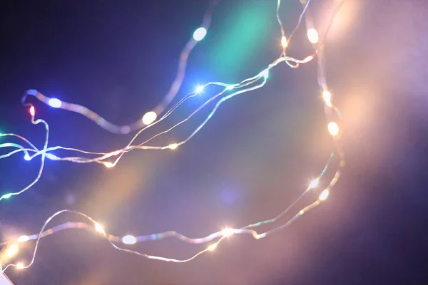 Soft Focur Blur Christmas Color Garland Lights Dark Wall Background — Stock Photo, Image