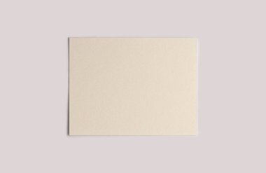 Bej rengi gri kağıdın üzerindeki boş tuval çerçeve. Soyut kopyalama alanı dokusu.