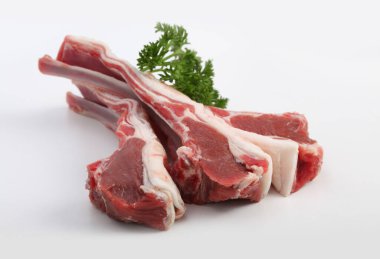 Raw lamb meat on light background