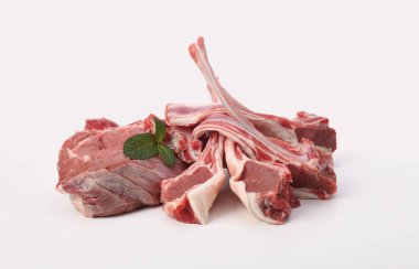Raw lamb and pork meat on light background