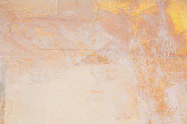 Grunge paper texture painting collage wall. Abstract gold, nacre and beige marble copy space background. clipart